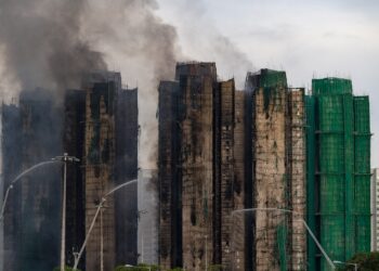 Hong Kong fire death toll rises to 128 as search continues