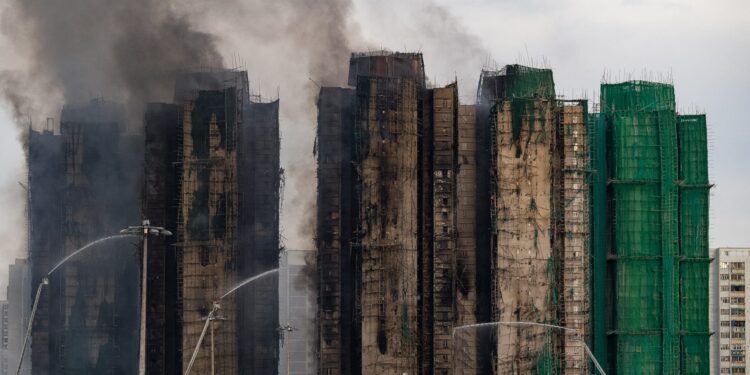 Hong Kong fire death toll rises to 128 as search continues